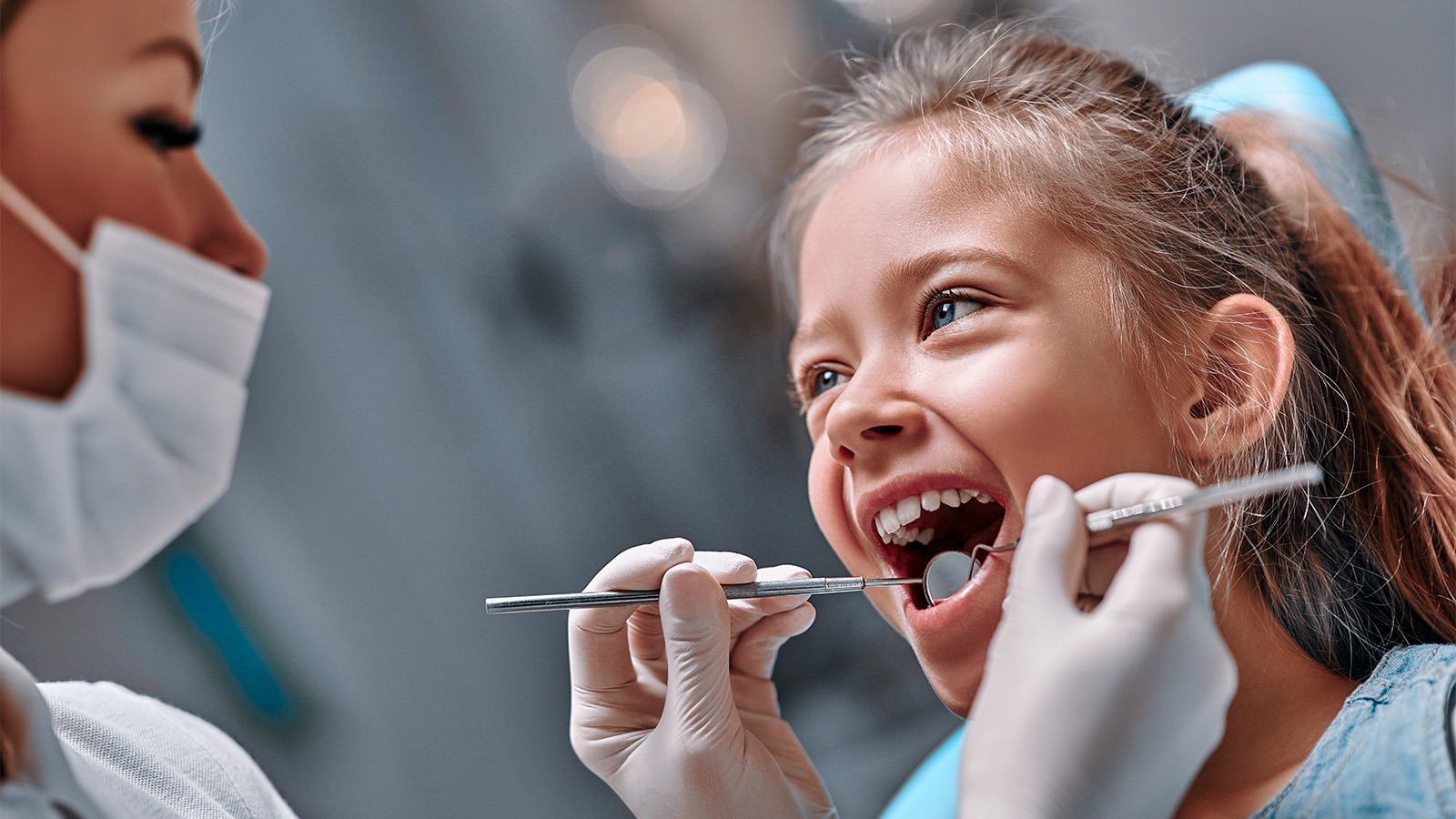 A collection of illustrated dentists stand in a row