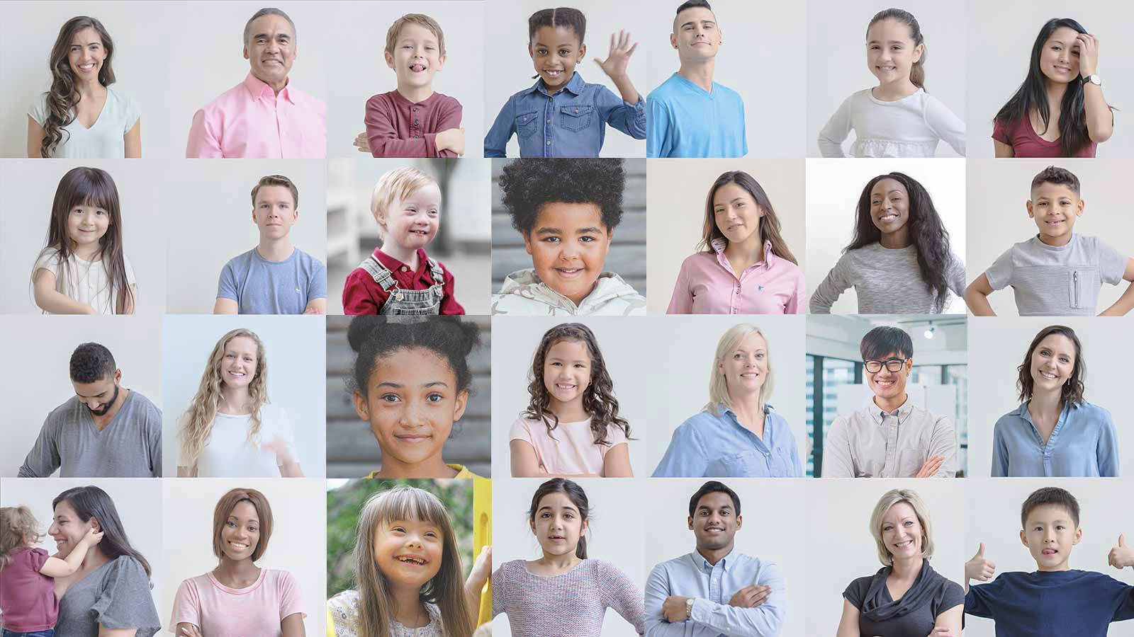 A grid of many young children smiling and happy